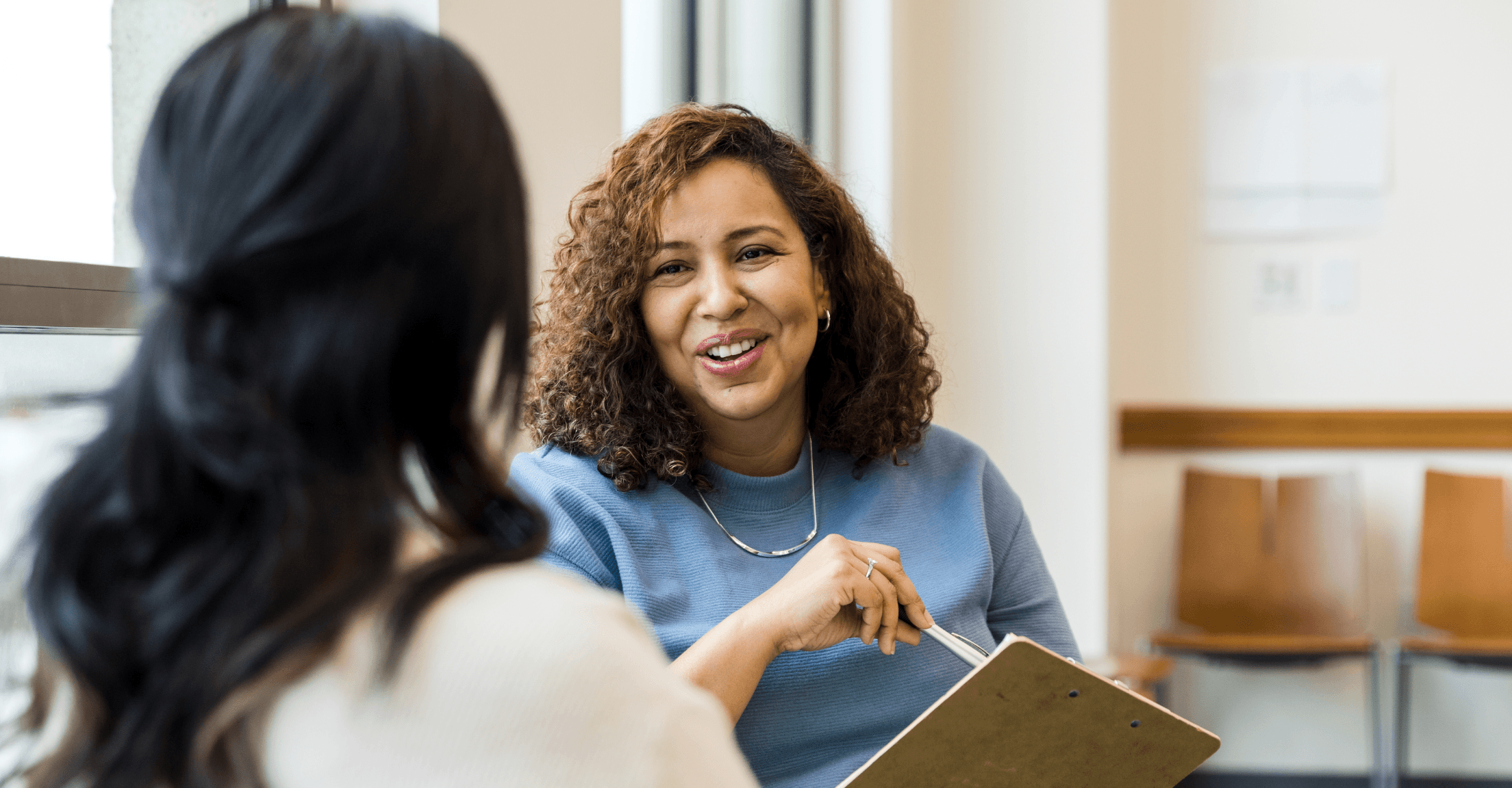 An advisor engaging with a client